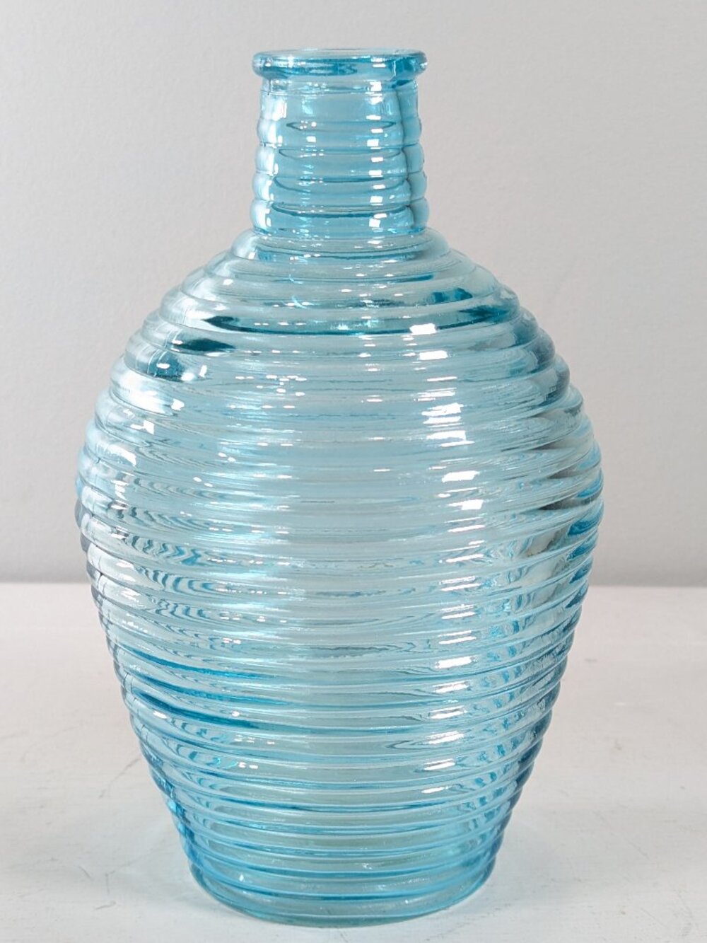 Blue Glass beehive water bottle, Ridged blue bottle bud vase